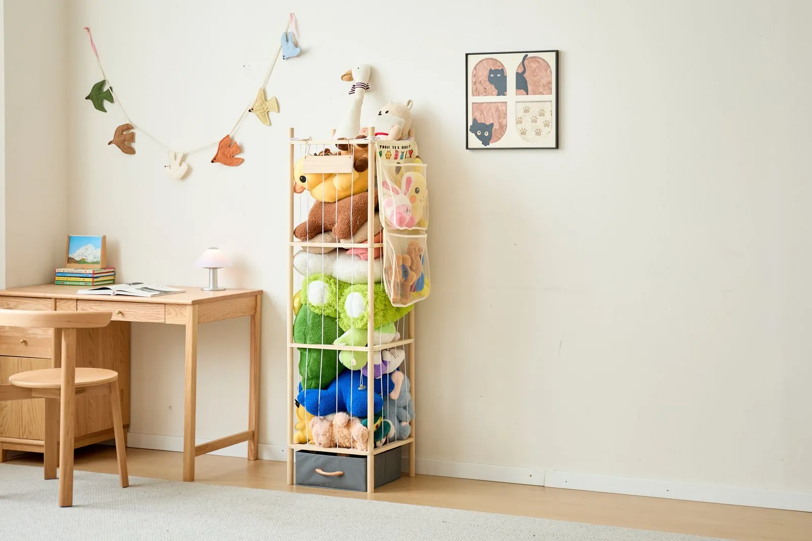 The Masterroute wooden stuffed animal organizer filled with plush toys in a calm bedroom